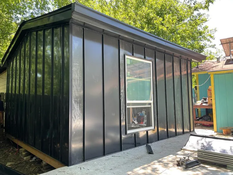 Black standing seam metal wall panels for Metal Roof Installation in Sturtevant