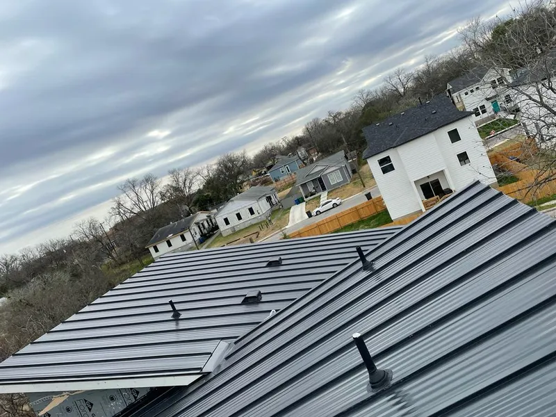 Standing seam metal roof panels with vents for Skylight Repair in Sturtevant